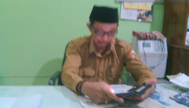 Kepsek SMPN 21 Kota Pekanbaru H Asmar SPd
