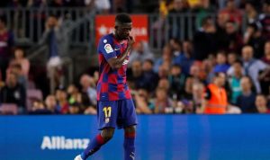 Ousmane Dembele diganjar kartu merah saat Barcelona melawan Sevilla.